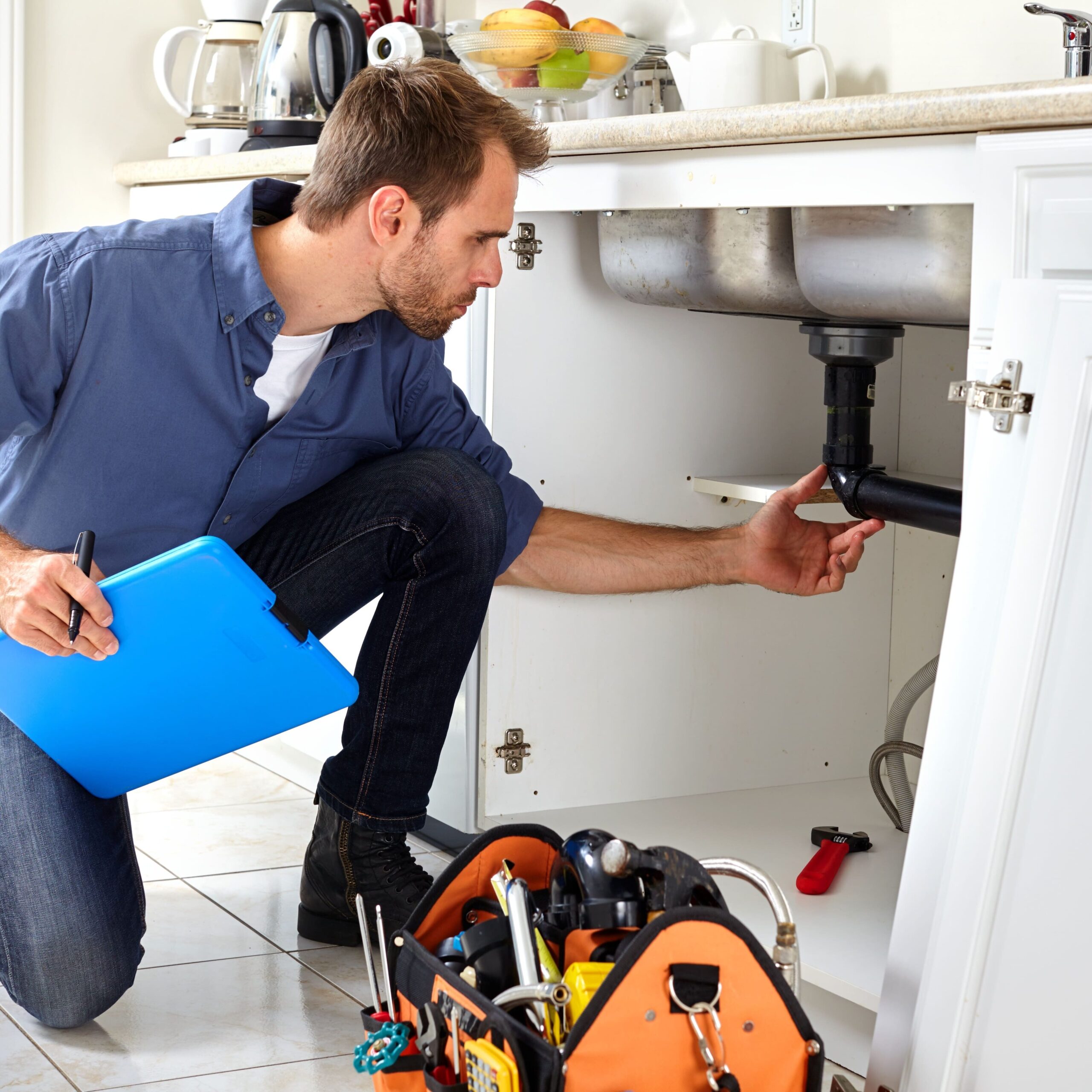 Professional plumber doing renovation
